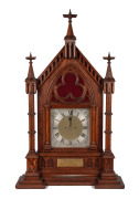 THOMAS GAUNT & Co. of Melbourne, impressive antique English twin train clock in Gothic oak architectural case, late 19th century, bearing brass plaque inscribed "Presented To The Medical Society Of Victoria By A Few Of His Personal Friends, In Memory Of W
