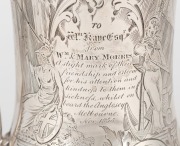 An antique sterling silver presentation tankard, engraved "To Wm. KANE Esq. from Wm. & MARY MORRIS As A Slight Mark Of Their Friendship & Esteem For His Attention & Kindness To Them In Sickness Whilst On Board The ANGLESEY, Melbourne, Nov. 1855". Manufact - 4