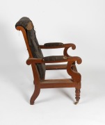 An antique Australian cedar reclining library armchair with original polish with remnants of horsehair upholstery, New South Wales origin, circa 1860, note: missing drop-in seat frame. 107cm high, 58cm across the arm. - 2
