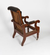 An antique Australian cedar reclining library armchair with original polish with remnants of horsehair upholstery, New South Wales origin, circa 1860, note: missing drop-in seat frame. 107cm high, 58cm across the arm. - 3