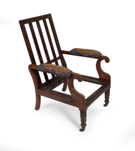291 · An antique Australian cedar reclining library armchair with scroll arms, splat back and triple ring turned front legs plus original brass castors, New South Wales origin, circa 1845, note: missing drop-in seat frame and back cushion frame. 89cm high, 59cm across the arms.