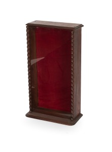 An Australian cedar countertop display cabinet with barley twist columns and red velvet backing, 19th/20th century, 74cm high, 42cm wide, 15cm deep.