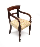 An antique Australian spade back carver chair with later floral upholstery, circa 1850, 48cm across the arms