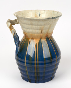 REMUED blue and cream glazed pottery vase with ribbed decoration and branch handle, incised "Remued, 313/9", 22.5cm high