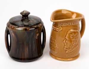 HOFFMAN WARE "Melbourne Centenary Fawkner Batman" pottery jug; together with a REGAL MASHMAN lidded pottery jar, (2 items), the jug 12.5cm high