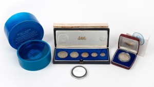 A diverse little group comprising of Australia 1982 $10 Commonwealth Games Proof in case; SWAZILAND 1968 Proof set in case of issue; a 2010 Fiji $2 Taku - Hawksbill Turtle 1oz silver with gold highlights Proof in ornate box of issue; and a 1oz silver Pawn Shop medallion "In the old man we trust".