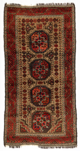 A vintage hand-knotted tribal wool rug on crimson ground, 170 x 85cm.