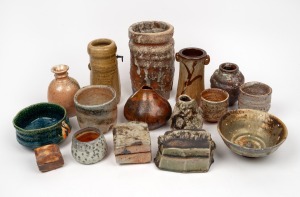 Sixteen assorted Australian art pottery vases, bowls and lidded boxes, artists include CATH O'GORMAN, the largest 20cm high