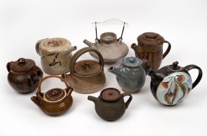Nine assorted Australian art pottery teapots, the largest 15cm high