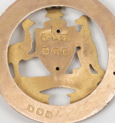 WILLIS & SONS of Melbourne antique 9ct gold fob with Australian coat of arms surrounded by a laurel reef, circa 1900, 2.1 grams. - 2
