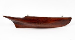 An antique Australian huon pine half hull boat model, 19th/20th century, 15 x 89cm.