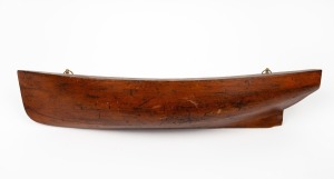 An antique Australian pine half hull boat model, 19th/20th century, 11 x 65cm.