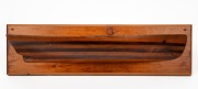 An antique Australian cedar and pine half hull boat builder's model on later back board, 19th/20th century, 16 x 57cm.