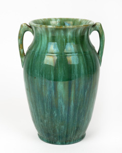 JOHN CAMPBELL green glazed pottery two handled vase, incised "John Campbell, Tasmania", ​​​​​​​26.5cm high.