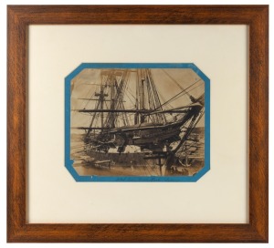 "H.M.S. IRIS, FITZROY DOCK, SYDNEY" albumen paper print laid down on backing card, circa 1865., image size 23 x 29cm, 51 x 56cm overall.