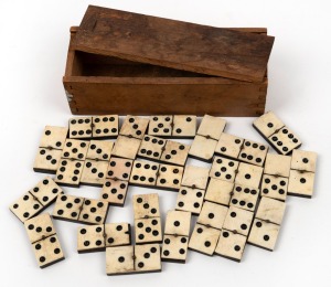 Antique whalebone and ebony dominoes in timber box, 19th century, tile size 3.7cm long.