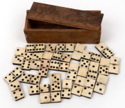 Antique whalebone and ebony dominoes in timber box, 19th century, tile size 3.7cm long.