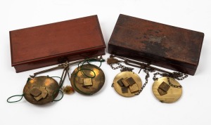 Two antique gold scales in timber cases, 19th century, the larger 21cm wide