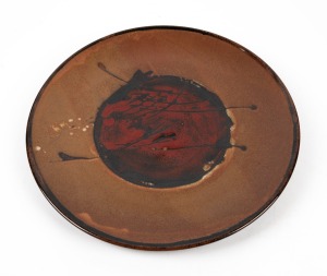 GREG DALY&nbsp;brown and red glazed pottery platter, signed "Daly, '97", 42cm diameter