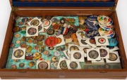 BADGES: Collection of antique and vintage lapel badges, including patriotic war examples, royal visits, politics and sport. Inspection will reward. (qty). Housed in a timber cutlery canteen.