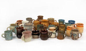 Twenty seven assorted pottery mugs, mixed makers and vintages, the largest 12cm high