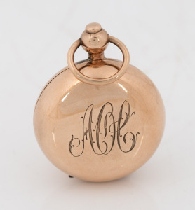 ROBERT ROLLASON of Sydney, antique 9ct rose gold sovereign case with engraved monogram and inscription, early 20th century, 4.5cm high including bow, 16.4 grams total.