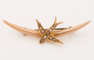WILLIS & SONS of Melbourne antique 9ct gold swallow brooch adorned with seed pearls, early 20th century, ​​​​​​​5.2cm wide, 2.6 grams.