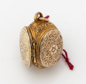 An unusual antique yellow gold triple door locket, made to house six images, circa 1870, 2.3cm high, 6.6 grams total.