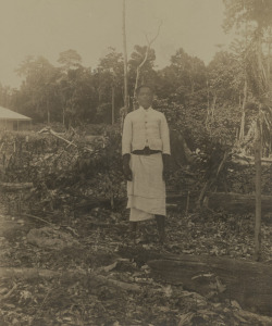 [FIJI INTEREST] Portrait of a Fijian man by an unknown photographer, possibly associated with Weslian Methodist Mission, circa 1907. Large format silver bromide print photograph, 29 x 24.5cm, mounted on original card 45 x 38.5cm overall.