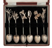 HARRIS & SON a boxed set of six Australian silver spoons with wildflower decoration, each titled on the reverse, Western Australian origin, 20th century, ​​​​​​​11cm long, 68 grams total.