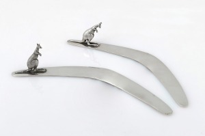 Two Australian silver boomerang letter openers with applied kangaroo decoration, 20th century, 18cm and 18.5cm long, 100 grams total.