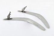 Two Australian silver boomerang letter openers with applied kangaroo decoration, 20th century, 18cm and 18.5cm long, 100 grams total.