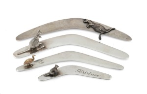 Four Australian silver boomerang letter openers, three with applied kangaroo decoration, the other with 9ct gold emu decoration, 20th century, the largest 14.5cm long, 89 grams total (including gold).