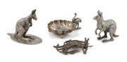 Three antique Australian silver An Australian silver kangaroo ornament (missing some of the tail), two antique Australian silver plated kangaroo ornaments, together with a silver plated salt cellar with emu decoration, 19th/20th century, (4 items), the la