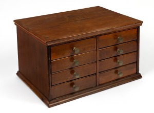 "THE ORTO BOOT & SHOE LACES" eight drawer kauri pine miniature haberdashery chest with branded logo to top, 19th/20th century, 25cm high, 44cm wide, 31cm deep.