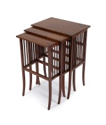 A nest of three fine quality fiddleback blackwood occasional tables, most likely from the workshop of Harry Goldman or ROJO, early 20th century, the largest 66cm high, 46cm wide, 31cm deep.