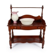 An antique Australian cedar washstand with rail back, 19th century, 125cm high, 100cm wide, 52cm deep.