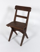 An unusual Australian hardwood dining chair with cross stretcher construction, 20th century, ​​​​​​​85cm high.