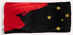 AUSTRALIAN FLAG DEBATE: Circa 1990s proposed Australian flag design, red black and gold with kangaroo profile, 175 x 86cm, presented to former AFL CEO Ross Oakley by the proponents of this design.