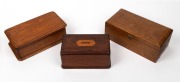 An Australian cedar and kauri pine donation box; together with a Queensland maple jewellery box lined in teal silk and an Australian cedar jewellery box lined in green felt, 19th/20th century, (3 items), the largest 25.5cm wide