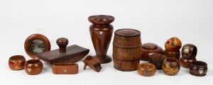 Seventeen assorted pieces of Australian blackwood and huon pine treen ware and pokerwork, including napkin rings, inkpot, vase and souvenir dish (with silver maps of Tasmania), etc. Mostly early 20th century, the vase 14cm high.
