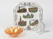 "ADVANCE AUSTRALIA" Federation porcelain plate, circa 1885, stamped "Designed By G. Hodgson. Jun. & Co. Summer Hill, Rd. No. 29565", a carnival glass "SHRIKE" bowl and a Hungarian white porcelain kangaroo statue, 19th and 20th century, (3 items), the plat