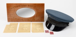 QUEENSLAND RAILWAYS oval bevelled mirror in silky oak mount with gilt lettering; together with a porter's hat, plus two Western Australian Government Railways Defence Force in uniform passes for December, 1942 and three WWII Ministry of Food ration sheets
