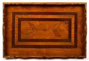 An antique Australian serving tray, featuring well figured Queensland maple, cedar and blackwood lozenge inlay and scalloped edge gallery, circa 1880, 51cm across the handles.