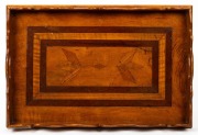 An antique Australian serving tray, featuring well figured Queensland maple, cedar and blackwood lozenge inlay and scalloped edge gallery, circa 1880, 51cm across the handles.