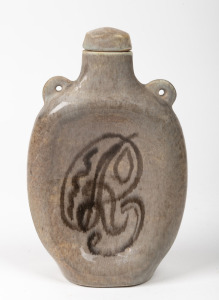 KLYTIE PATE pottery lidded bottle with unusual painted decoration and lug handles, incised "Klytie Pate", 20.5cm high.