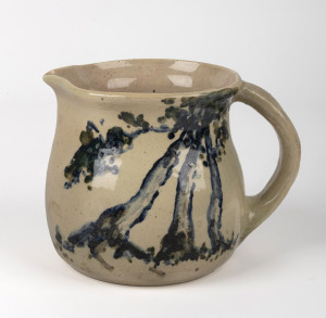 MERRIC BOYD and DORIS BOYD pottery jug with hand-painted trees in landscape decoration, incised "Merric Boyd, Decoration By Doris Boyd, 1931", 12cm high.