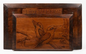 An antique Australian pokerwork newspaper rack with kookaburra decoration, circa 1920, 29 x 49cm.