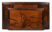 An antique Australian pokerwork newspaper rack with kookaburra decoration, circa 1920, 29 x 49cm.