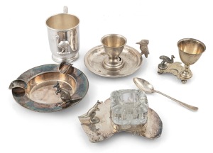 Antique and vintage Australian silver plated egg cups, inkwell, ashtray and christening mug, all adorned with Australian animals, 19th/20th century, (5 items), the emu mug 9cm high.